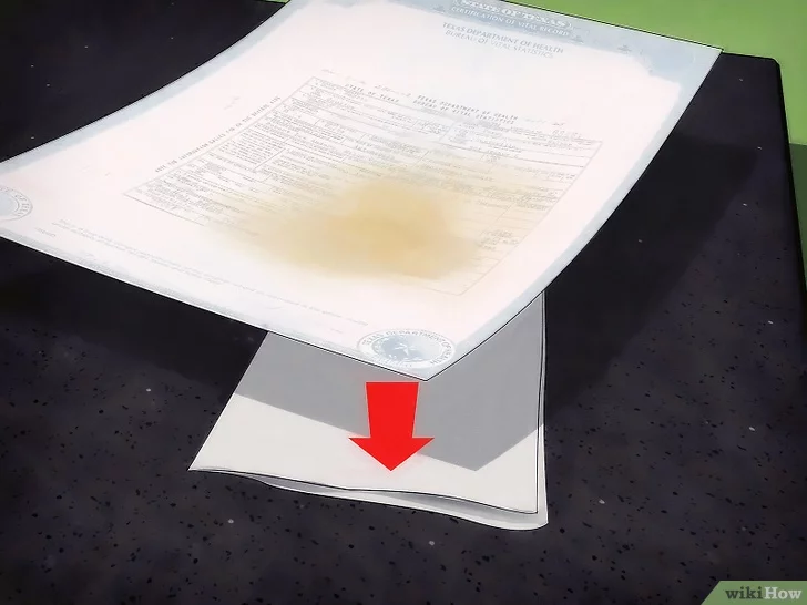 Как вывести жирное пятно с бумаги?